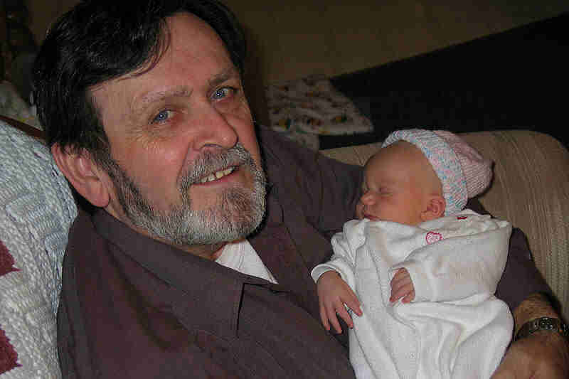 Here's Poppa with his new grand-daughter, Olivia June. Isn't she a doll?