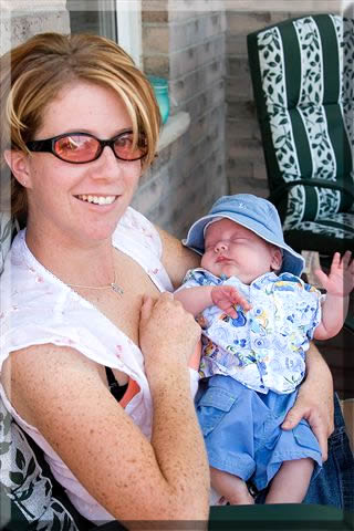 Ashlynn's Mommy holding her new cousin, Will.