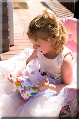 Ashlynn loves opening presents