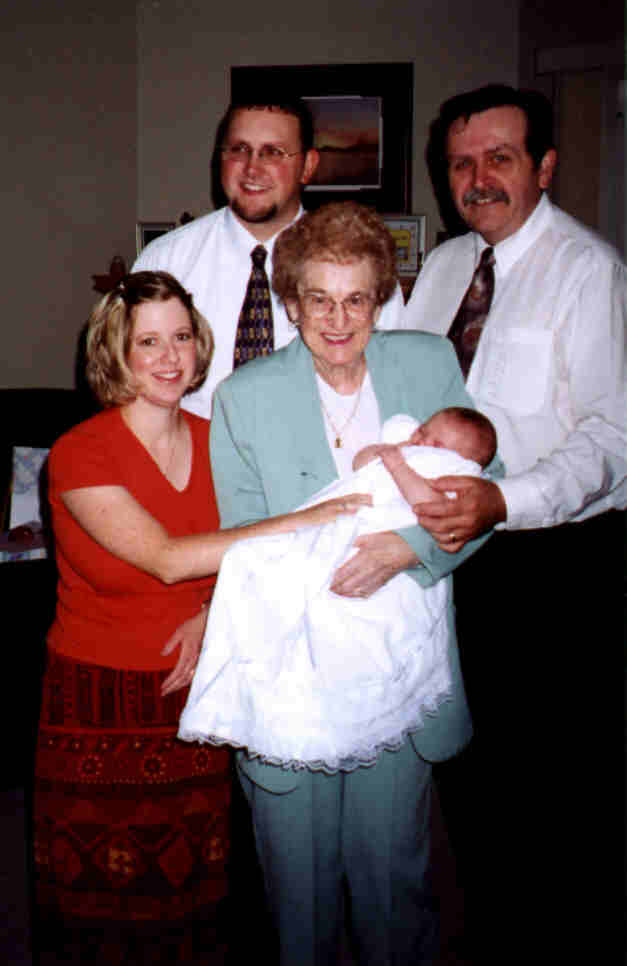 Great-Grandma June Toogood holding Ashlynn, with Jenn, Jeff & Poppa Norm