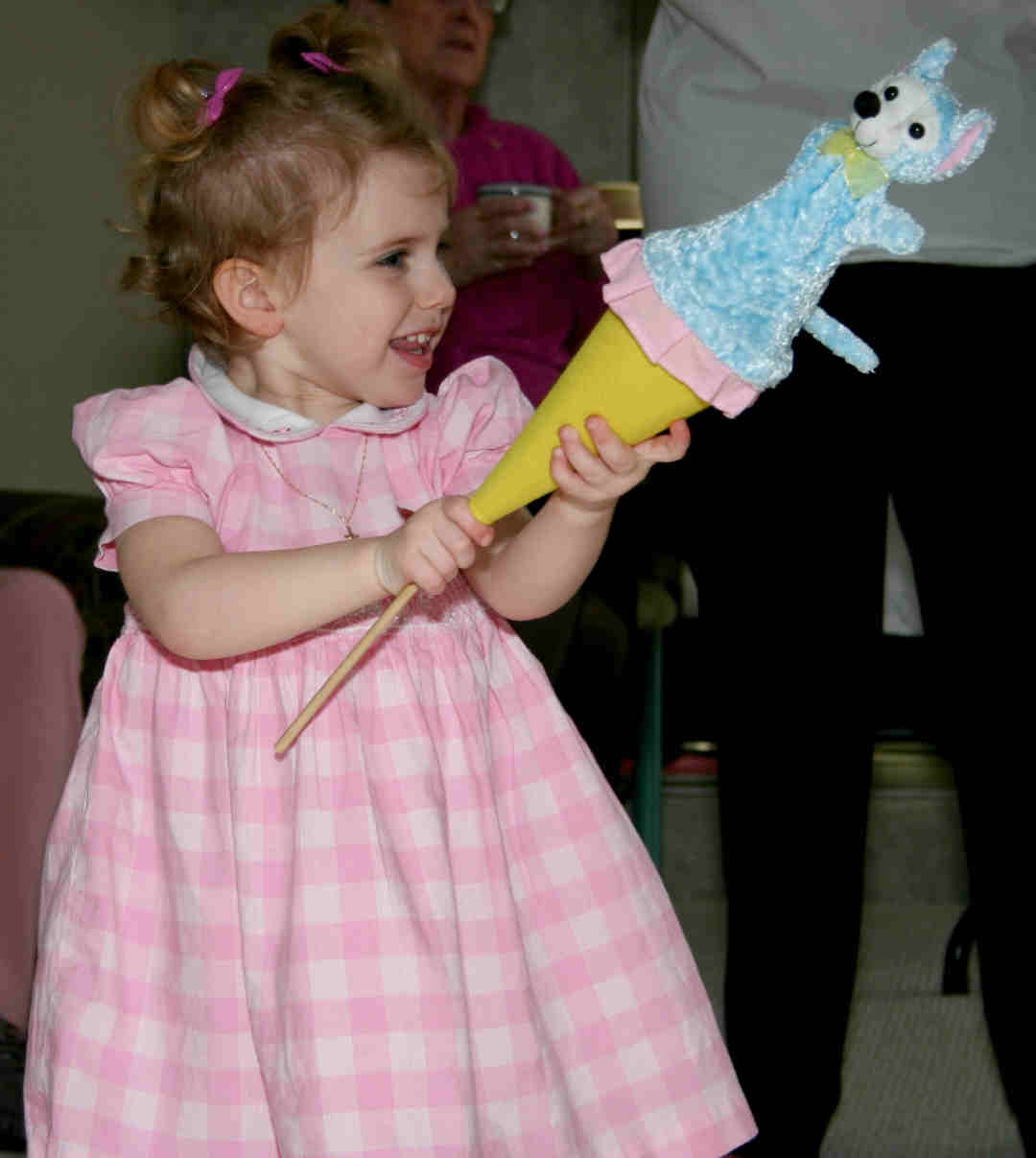 Playing "peek-a-boo" with her hide away mousie.